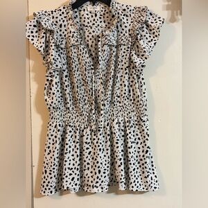 Umgee Black and White Smocked Blousewith Black design with hidden front buttons